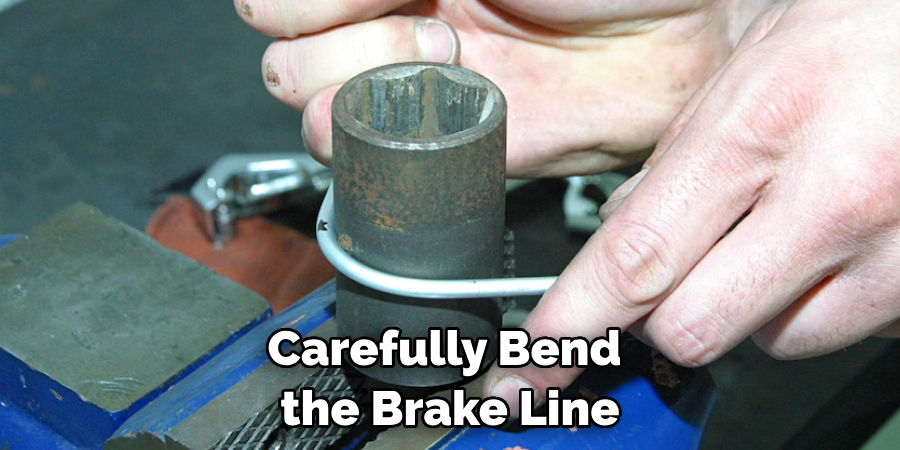 Carefully Bend the Brake Line