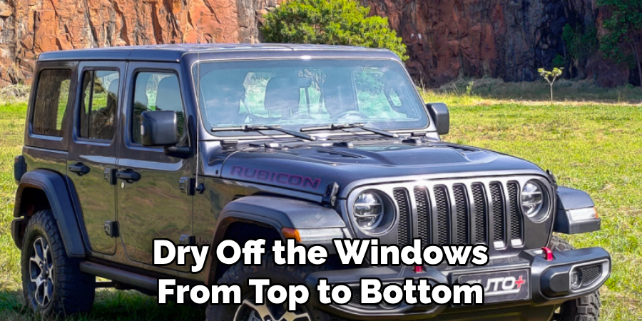 Dry Off the Windows From Top to Bottom