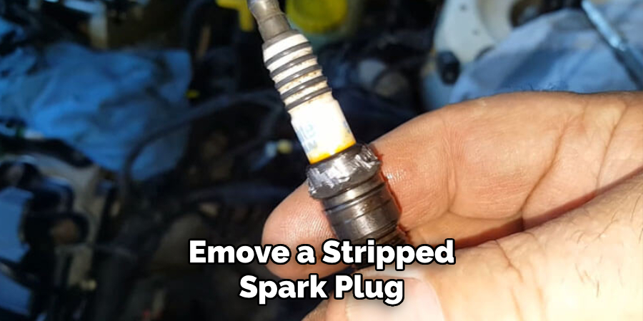Emove a Stripped Spark Plug
