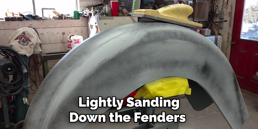 Lightly Sanding Down the Fenders 