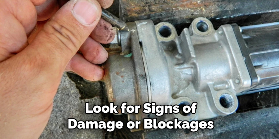 Look for Signs of Damage or Blockages