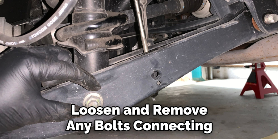 Loosen and Remove Any Bolts Connecting