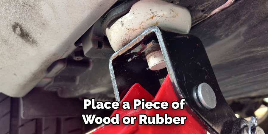 Place a Piece of Wood or Rubber