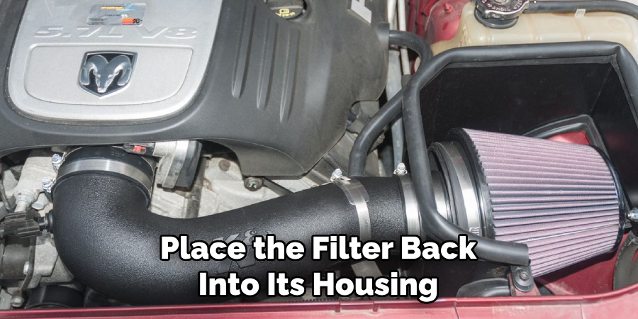 Place the Filter Back Into Its Housing