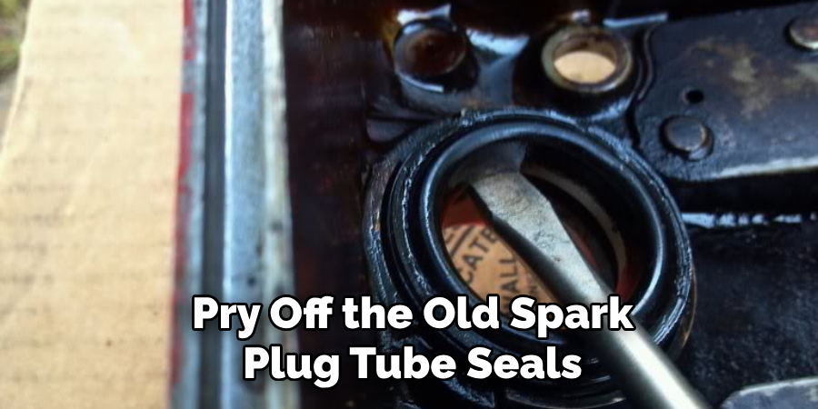 Pry Off the Old Spark Plug Tube Seals