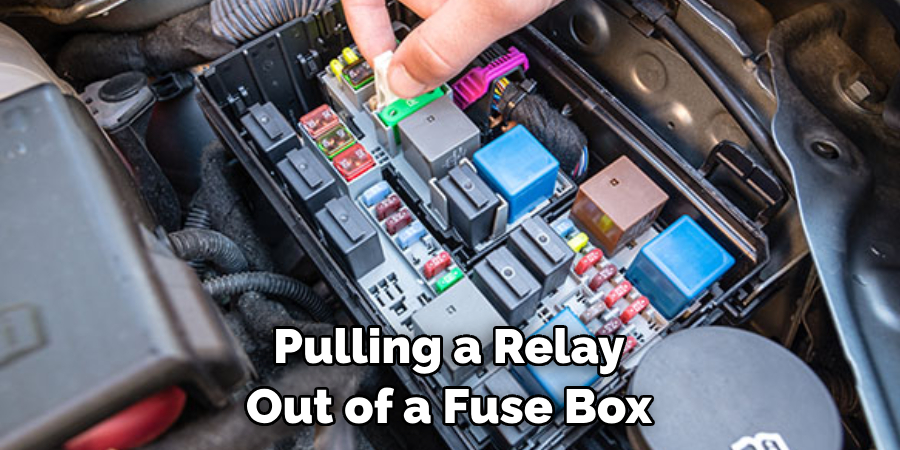 Pulling a Relay Out of a Fuse Box