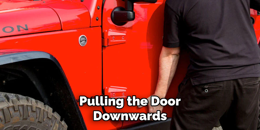 Pulling the Door Downwards