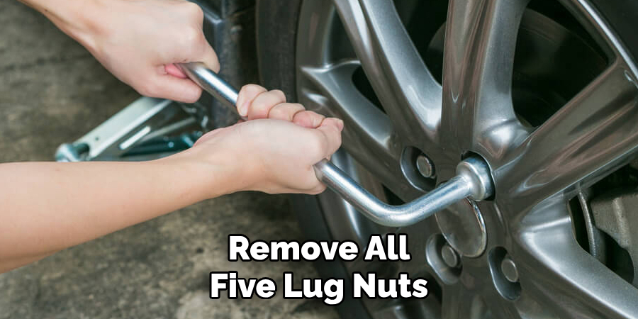 Remove All Five Lug Nuts