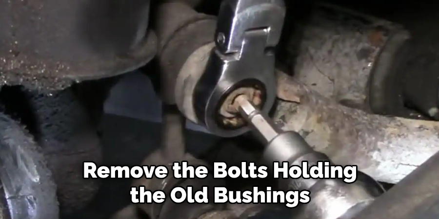 Remove the Bolts Holding the Old Bushings