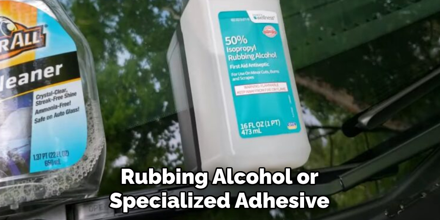 Rubbing Alcohol or Specialized Adhesive