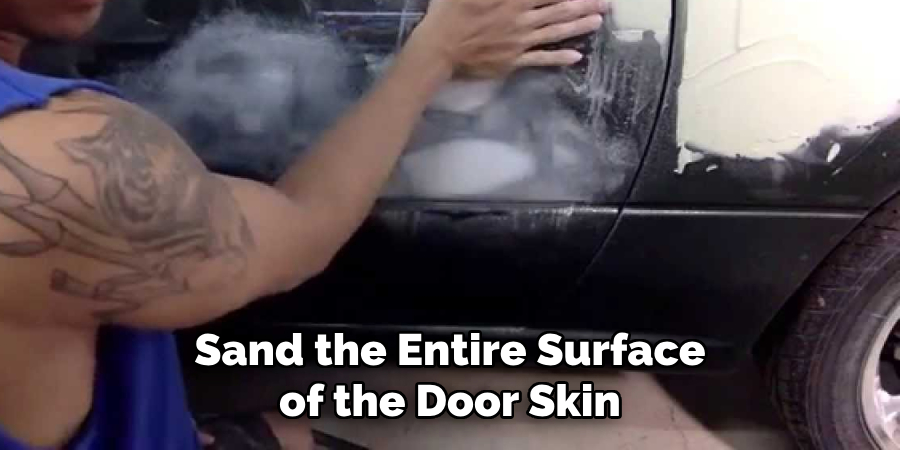 Sand the Entire Surface of the Door Skin