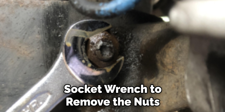 Socket Wrench to Remove the Nuts