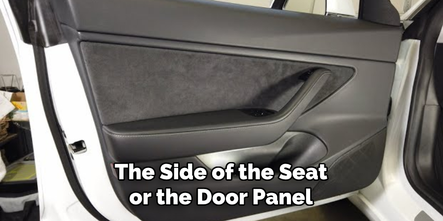 The Side of the Seat or the Door Panel