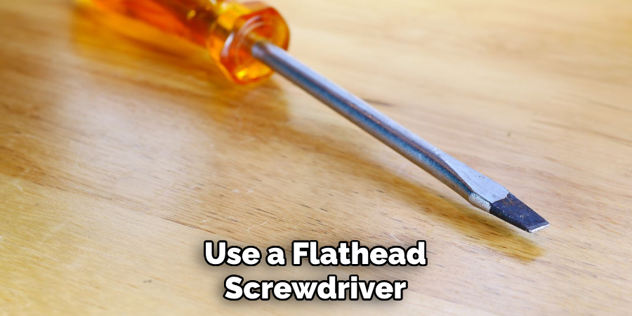 Use a Flathead Screwdriver