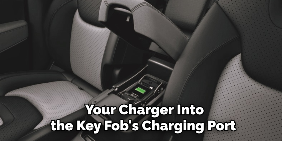 Your Charger Into the Key Fob's Charging Port