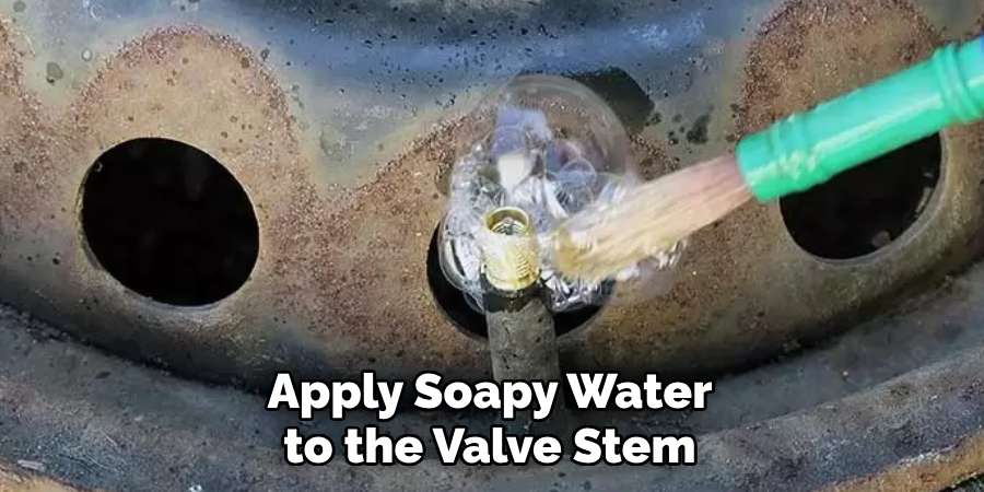 Apply Soapy Water to the Valve Stem