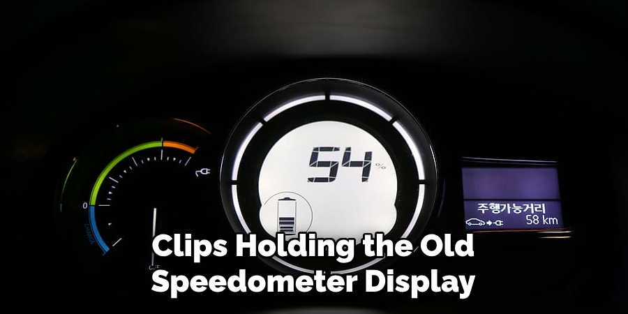 Clips Holding the Old Speedometer Display