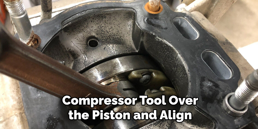 Compressor Tool Over the Piston and Align