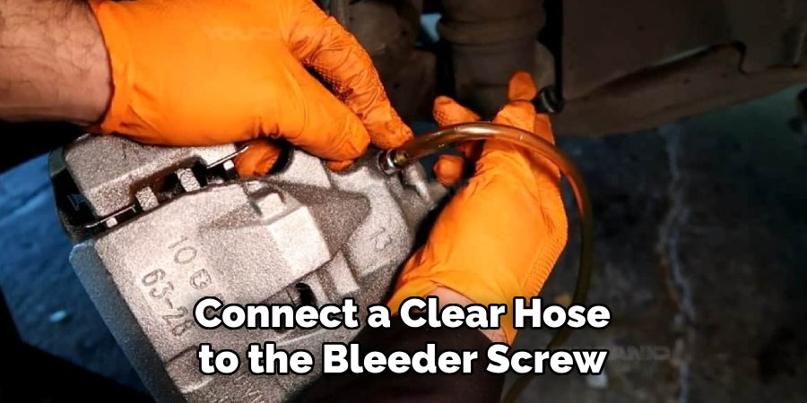 Connect a Clear Hose to the Bleeder Screw