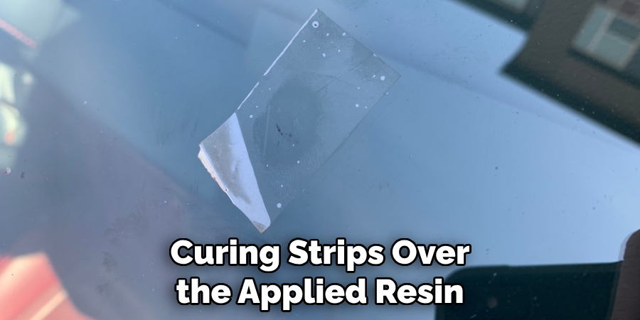 Curing Strips Over the Applied Resin