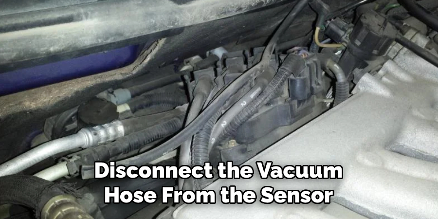 Disconnect the Vacuum Hose From the Sensor