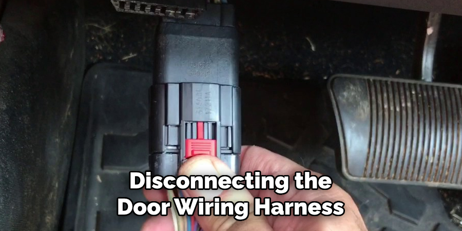 Disconnecting the Door Wiring Harness