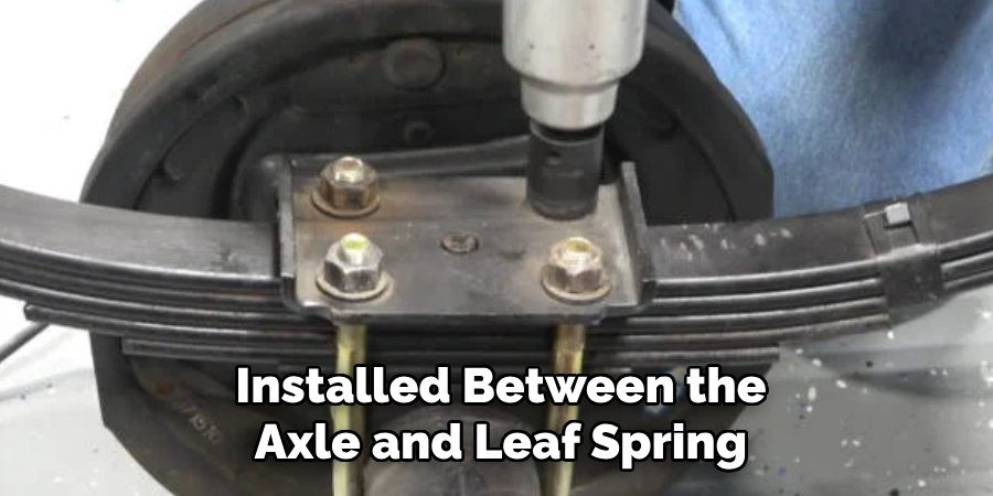 Installed Between the Axle and Leaf Spring