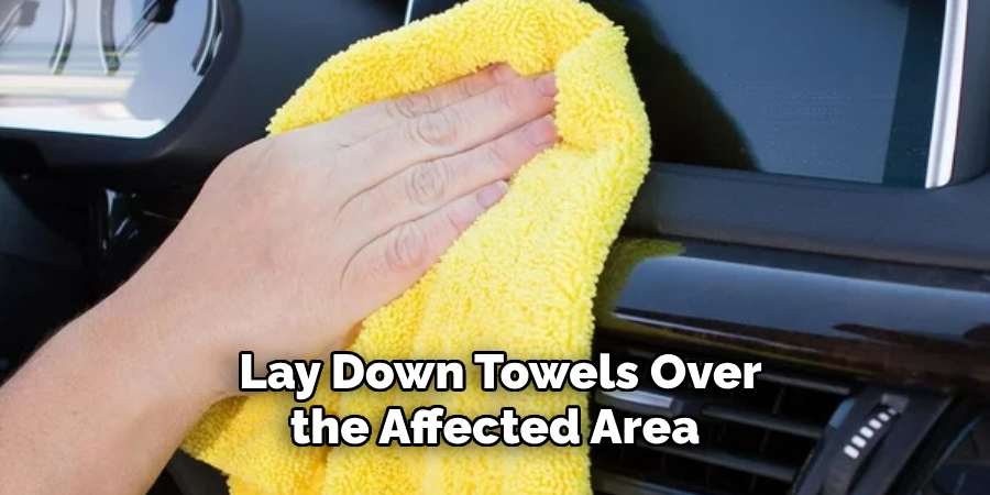 Lay Down Towels Over the Affected Area