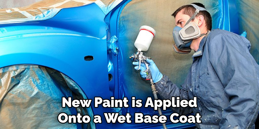 New Paint is Applied Onto a Wet Base Coat