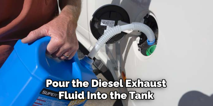 Pour the Diesel Exhaust Fluid Into the Tank