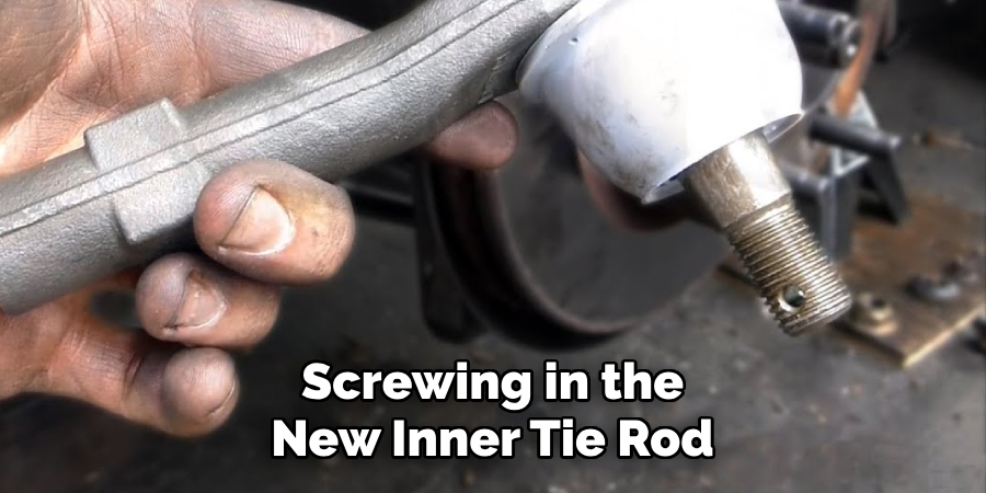 Screwing in the New Inner Tie Rod