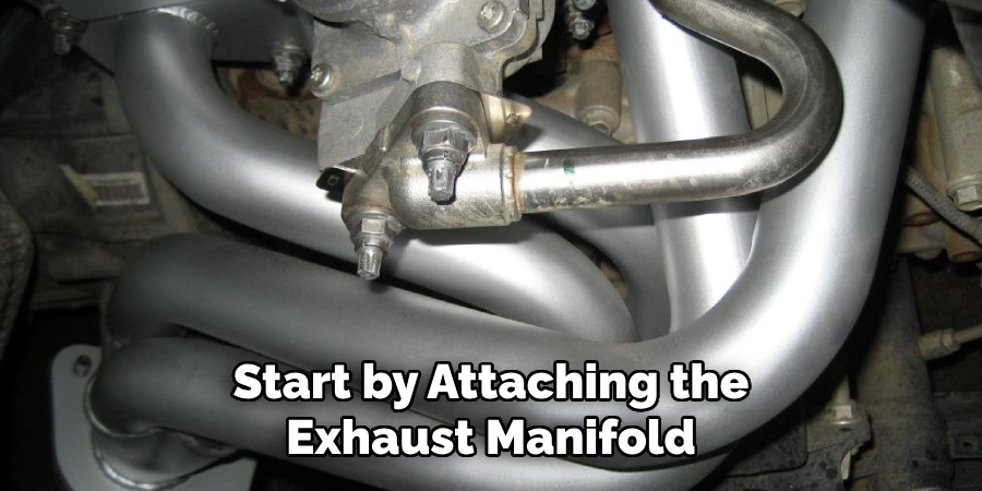 Start by Attaching the Exhaust Manifold