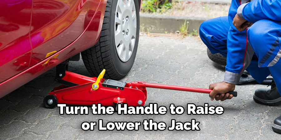 Turn the Handle to Raise or Lower the Jack