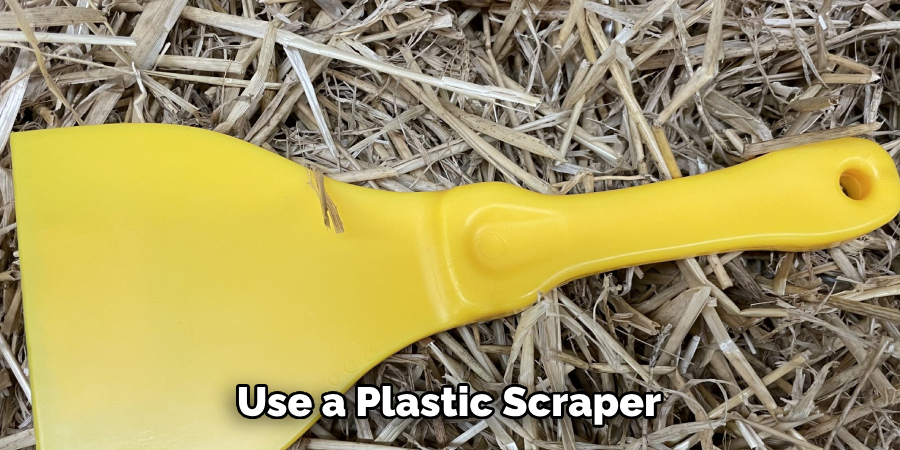 Use a Plastic Scraper