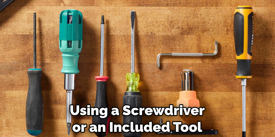 Using a Screwdriver or an Included Tool