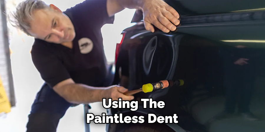 Using the Paintless Dent