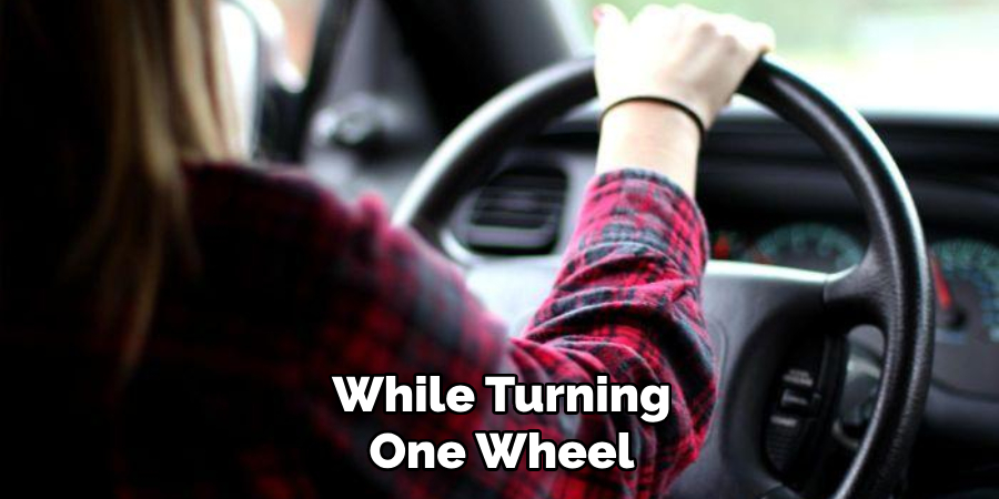 While Turning One Wheel