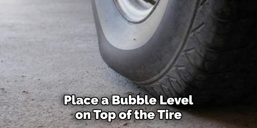 Place a Bubble Level on Top of the Tire