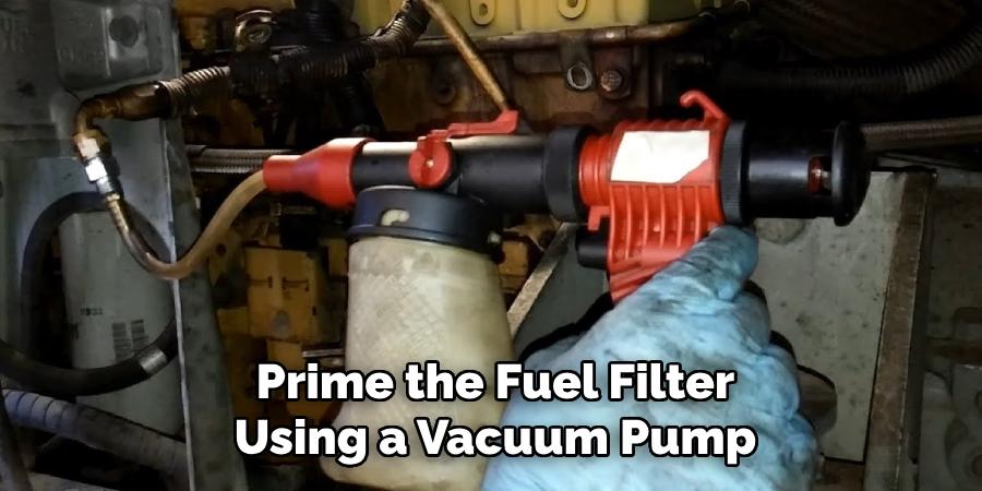Prime the Fuel Filter Using a Vacuum Pump