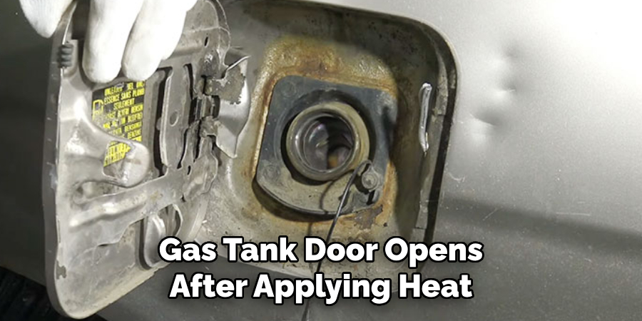 The Gas Tank Door Opens After Applying Heat